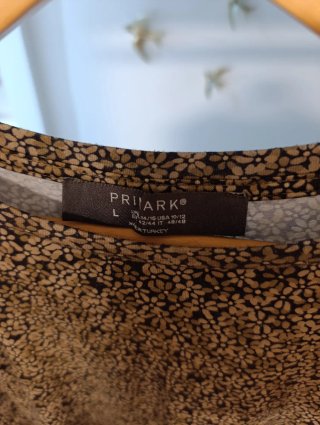 Vestido corto manga larga Primark