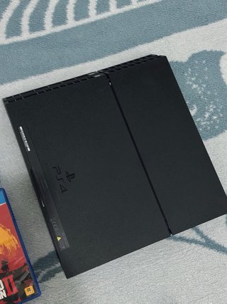PS4 (PlayStation 4) Negra + Mando + 2 Juegos