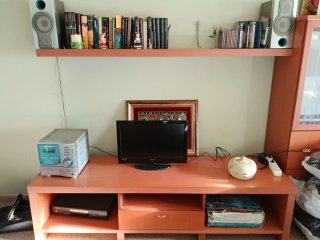 Mueble de salón madera y cristal