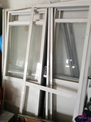 Puertas locutorio de cristal y aluminio
