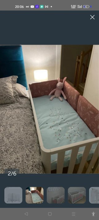 Cuna blanca con ruedas