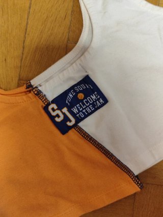 Top Pull&Bear Space Jam blanco y naranja