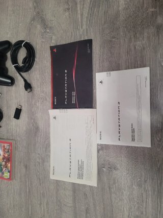 PS3 500gb  Super Slim + juegos con soporte vertica