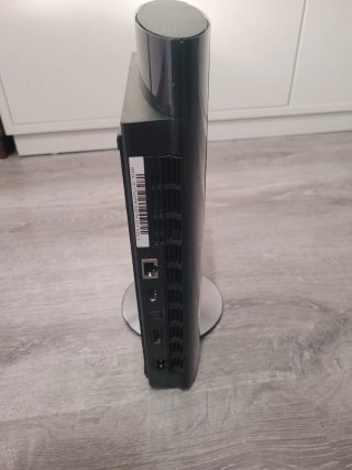PS3 500gb  Super Slim + juegos con soporte vertica