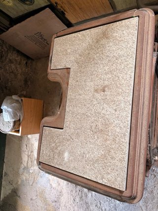 Cocina de leña metal y piedra