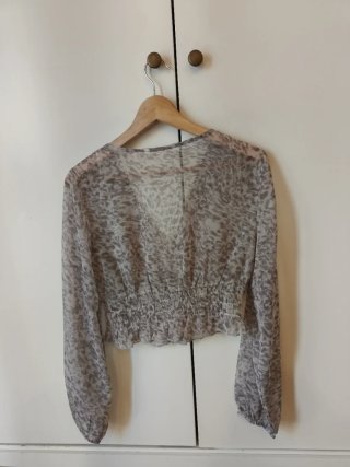 Blusa estampada manga larga