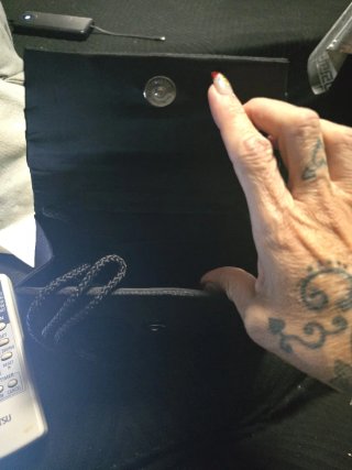 Bolso de fiesta negro con joya