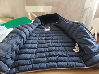 Piumino Colmar grigio con cappuccio