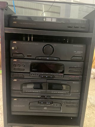 Equipo de música JVC con mueble