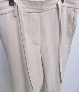 Pantalones fluidos beige mujer