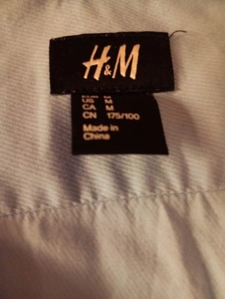 Camisa H&M azul con detalles