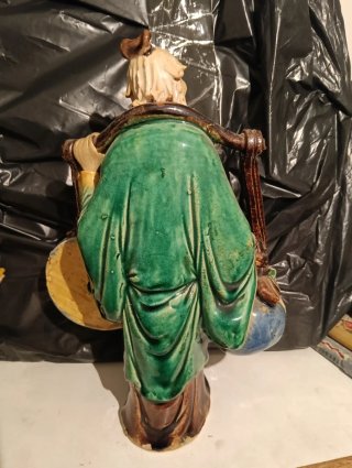 Figura pescador chino con monedas