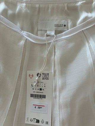 Falda Zara blanca larga plisada