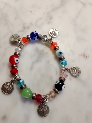 Pulsera elástica con abalorios y dijes de búho