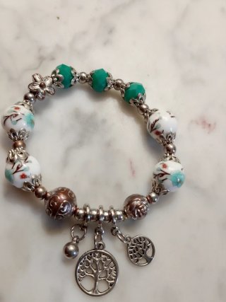 Pulsera elástica con abalorios y dijes de búho