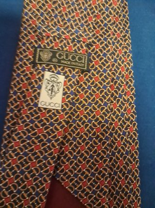 Corbata Gucci azul con dorado