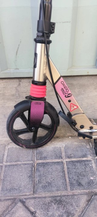 Patinete infantil  rosa y plateado. Oxelo midi 9