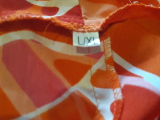 Vestido largo estampado naranja y blanco