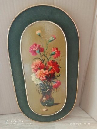 Pareja de cuadros de flores ovalados