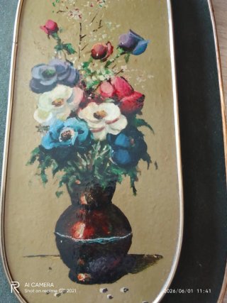 Pareja de cuadros de flores ovalados