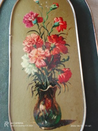 Pareja de cuadros de flores ovalados