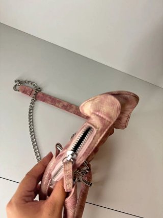 Bolso rosa efecto piel serpiente