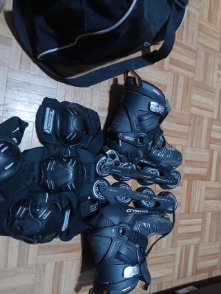 Patines Oxelo con protecciones y bolsa