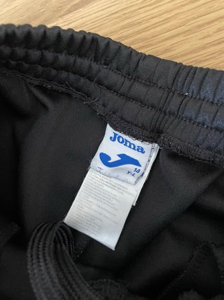 Pantalón chándal niño Joma negro