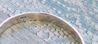 Pulsera de plata con peces