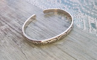 Pulsera de plata con peces
