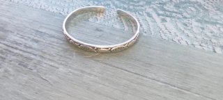 Pulsera de plata con peces