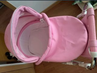 Carro de muñecas rosa pomipiel