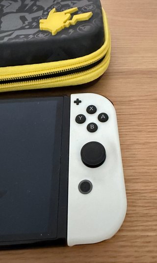 Nintendo Switch OLED + 4 Juegos