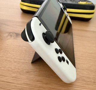Nintendo Switch OLED + 4 Juegos