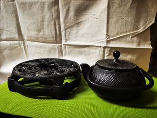 Tetera de hierro fundido con calentador