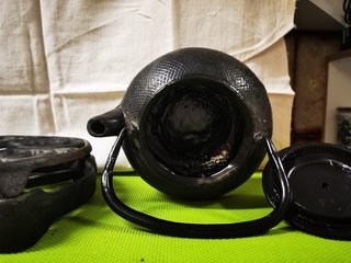 Tetera de hierro fundido con calentador