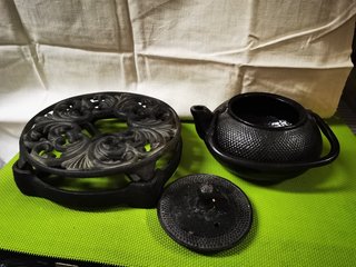 Tetera de hierro fundido con calentador
