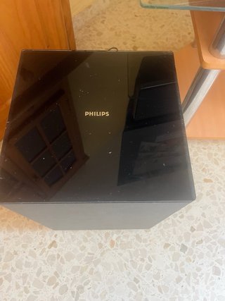 TV Philips con barra de sonido y mueble