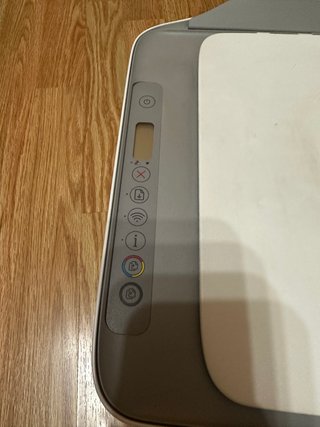 Impresora HP gris y blanca