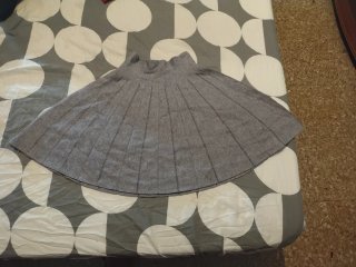 Estola gris plisada