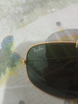 Gafas de sol Ray-Ban doradas y verdes