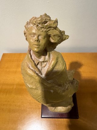 Escultura de figura humana