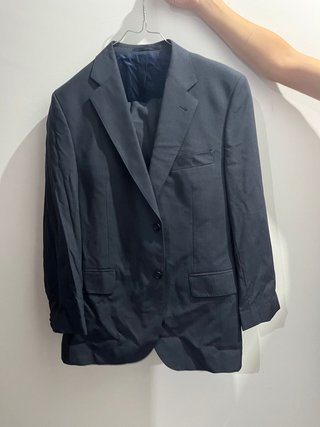 Traje negro chaqueta y pantalón