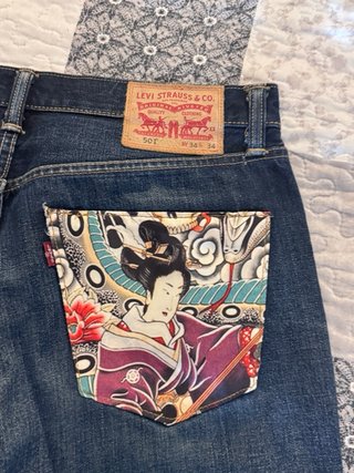 Jeans Levi's uomo strappati taglia 48