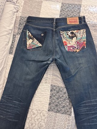 Jeans Levi's uomo strappati taglia 48