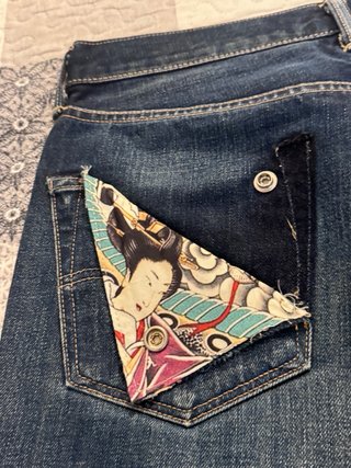 Jeans Levi's uomo strappati taglia 48
