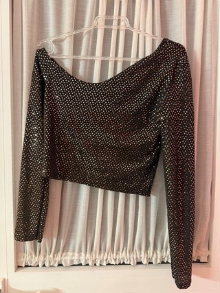Camiseta lentejuelas negra y dorada