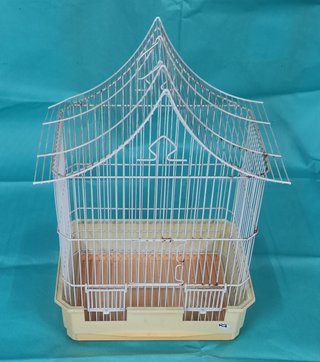 Jaula para pájaros con accesorios