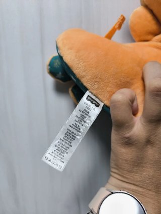 Foca bebé sonajero peluche naranja