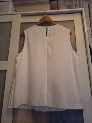 Blusa blanca plisada